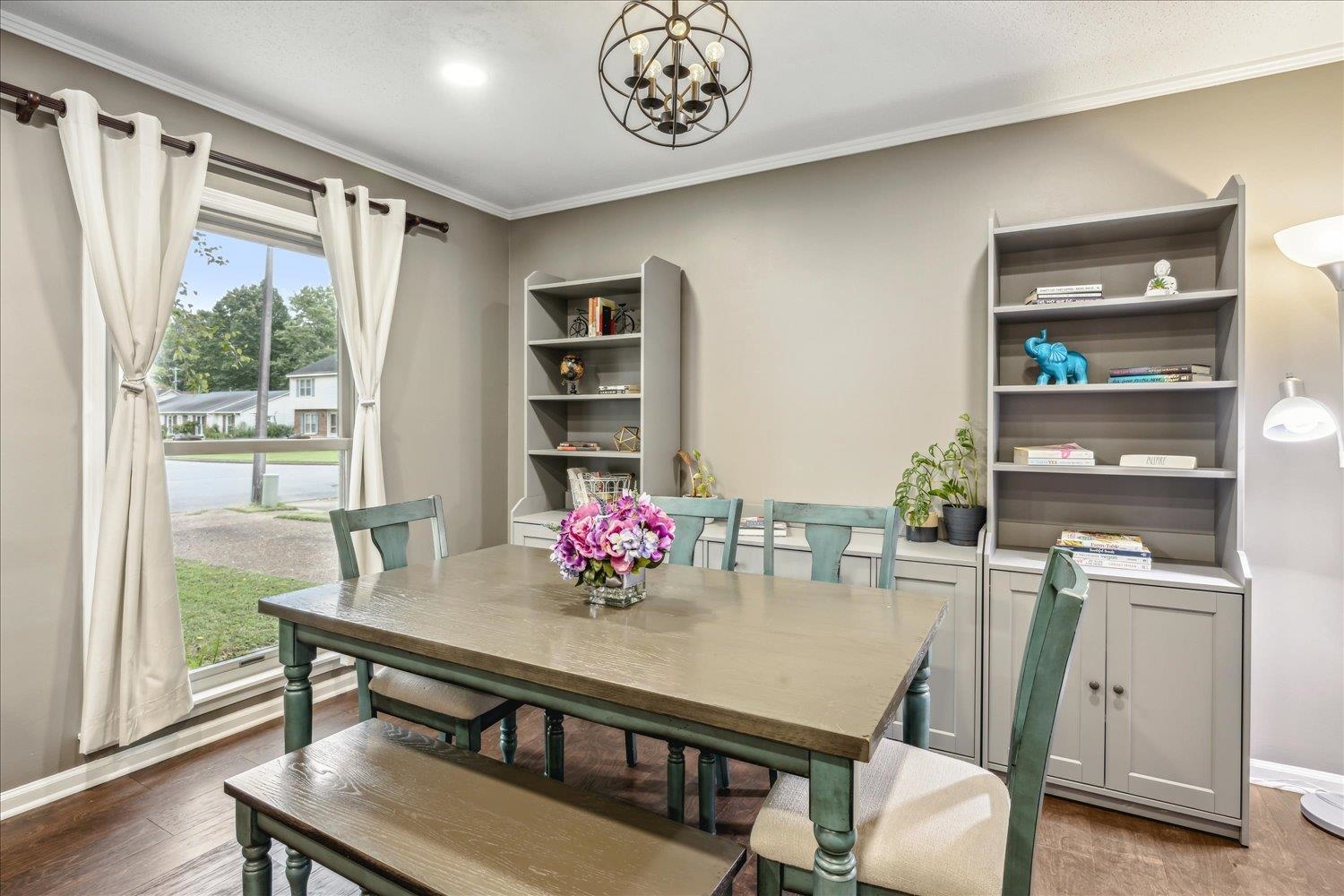 2397 Lynnfield Road Memphis, TN 38119 - Photo 19 of 28 a view of a dining room with furniture window and wooden floor