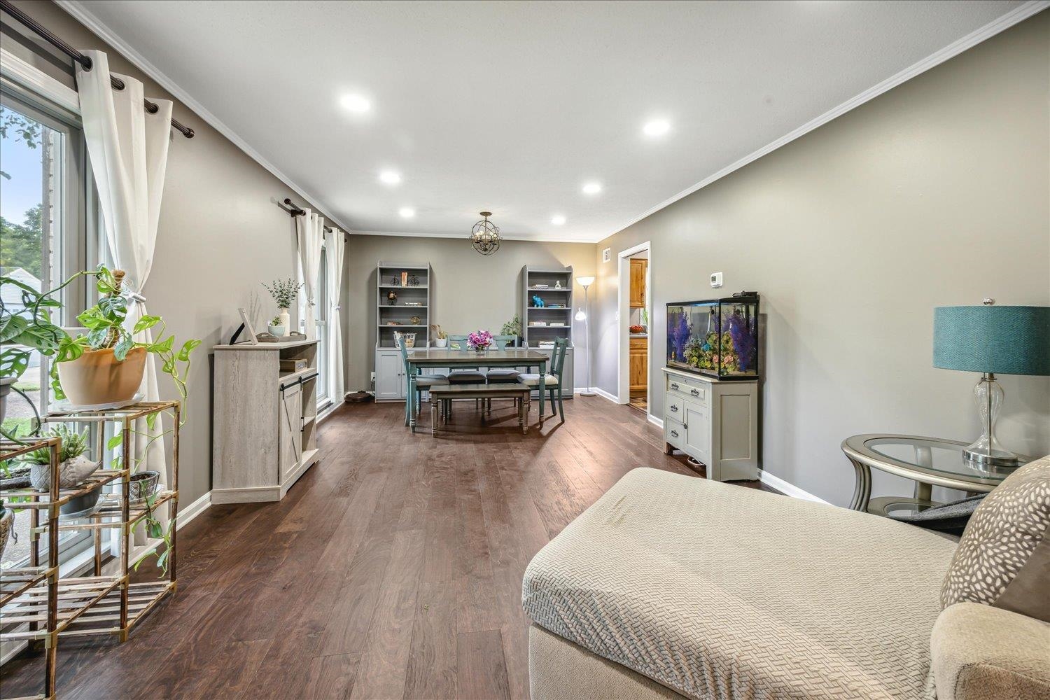 2397 Lynnfield Road Memphis, TN 38119 - Photo 22 of 28 a living room with furniture and a wooden floor