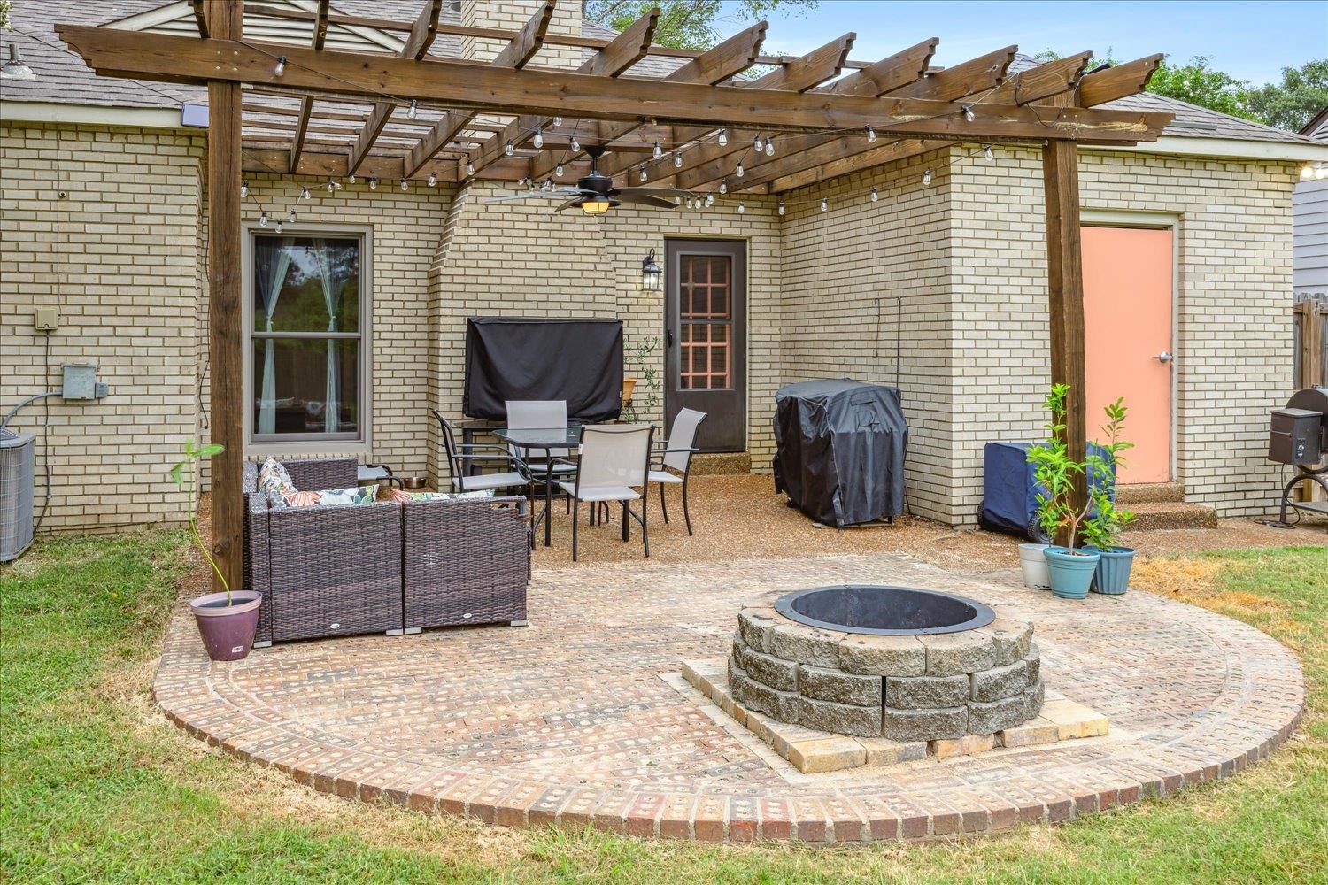 2397 Lynnfield Road Memphis, TN 38119 - Photo 24 of 28 a view of swimming pool with outdoor seating