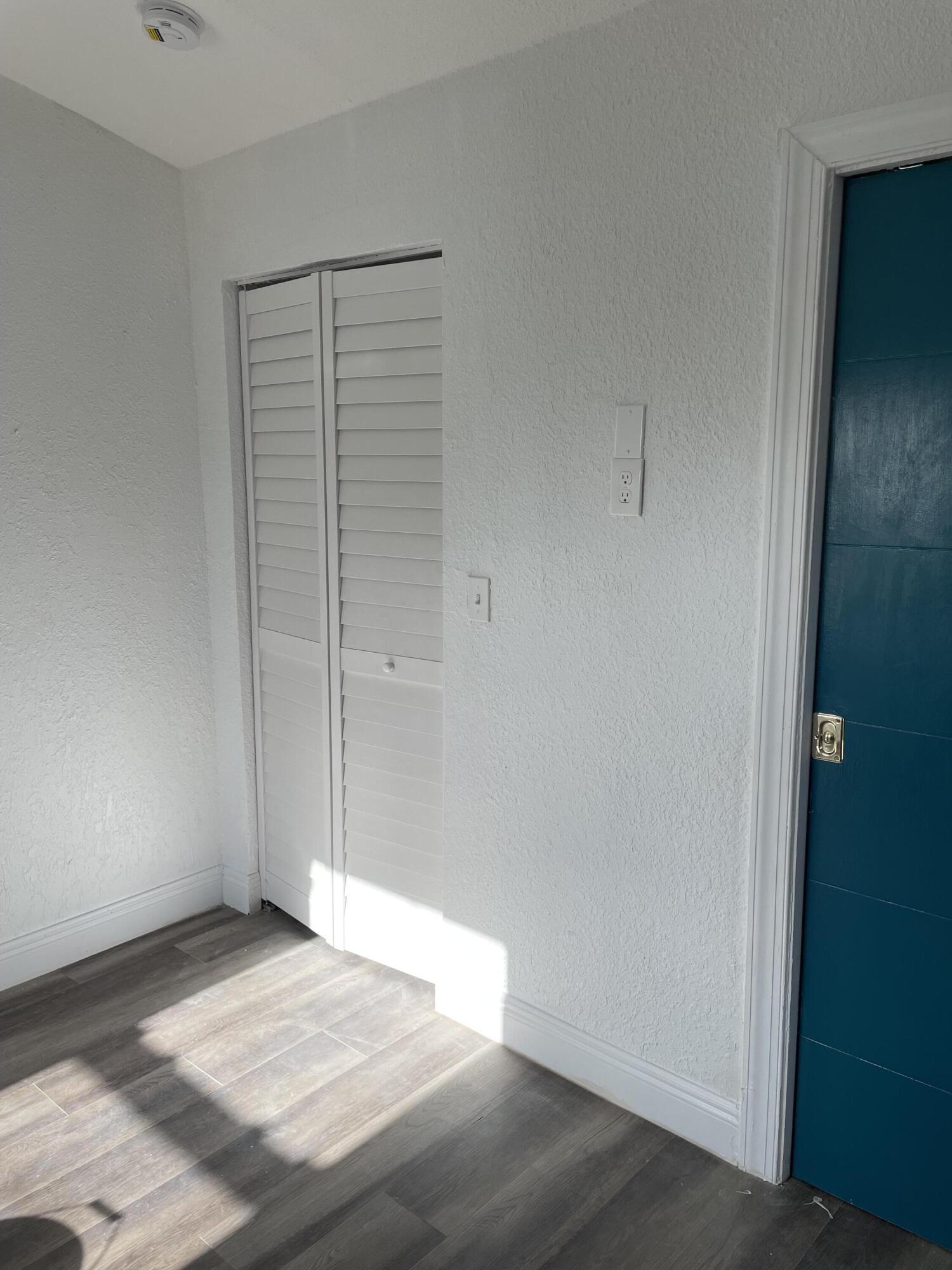 825 West 3rd Street, Unit 4 Riviera Beach, FL 33404 - Photo 6 of 7 a view of an empty room