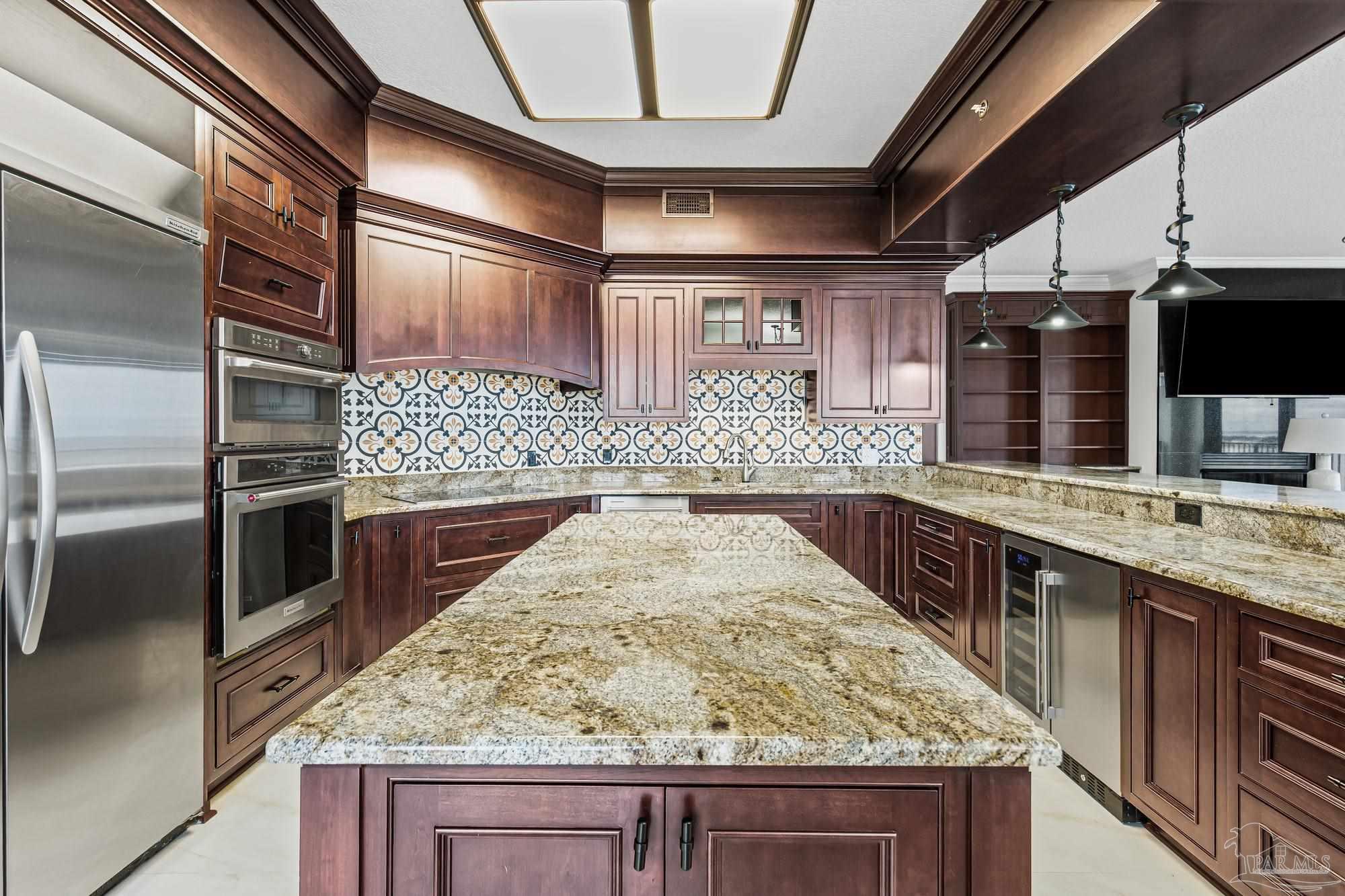 14900 River Road, Unit 904 Perdido Key, FL 32507 - Photo 12 of 62 a large kitchen with a stove and refrigerator