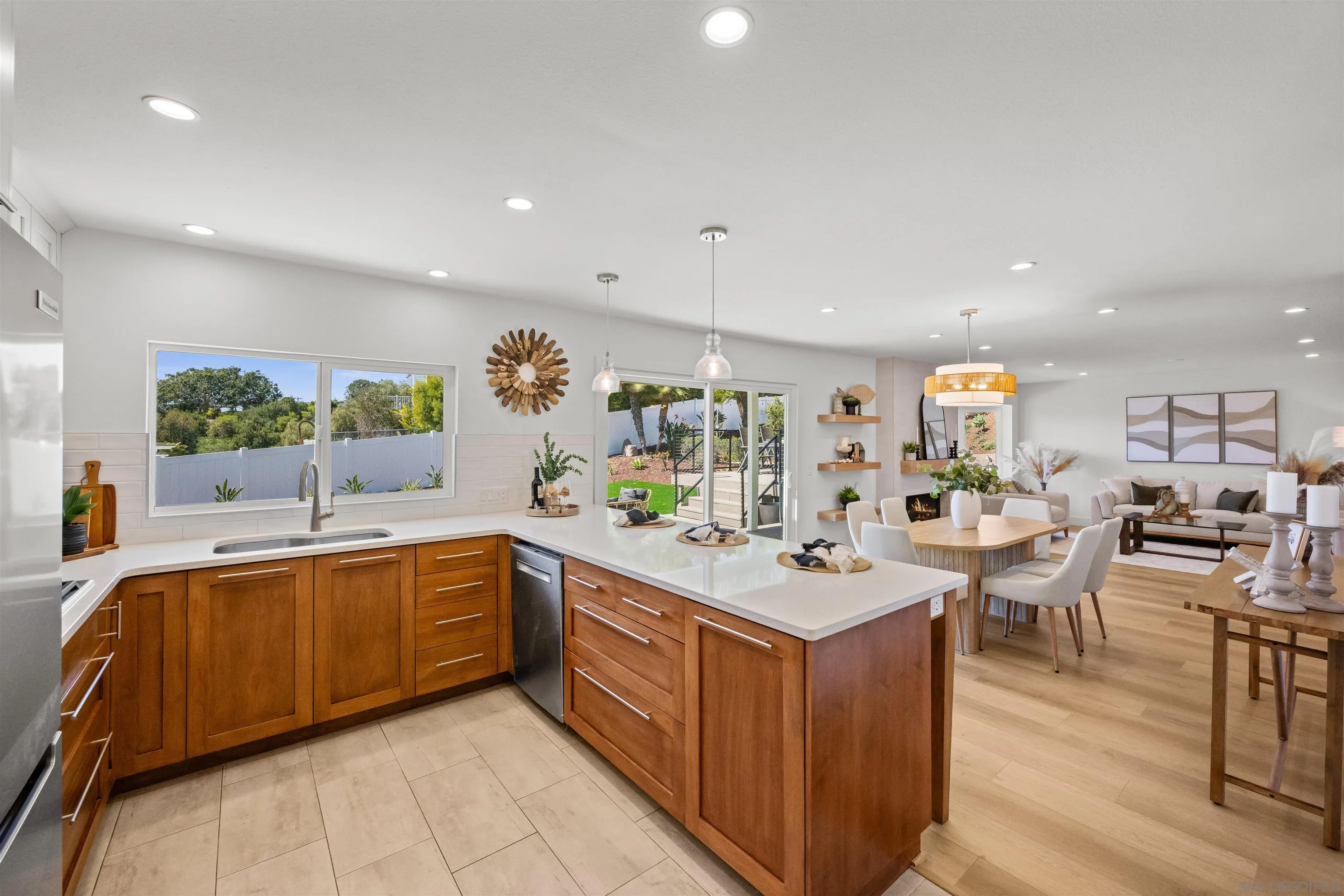 2001 Elevada Street Oceanside, CA 92054 - Photo 14 of 39 a large kitchen with a large counter top appliances and cabinets