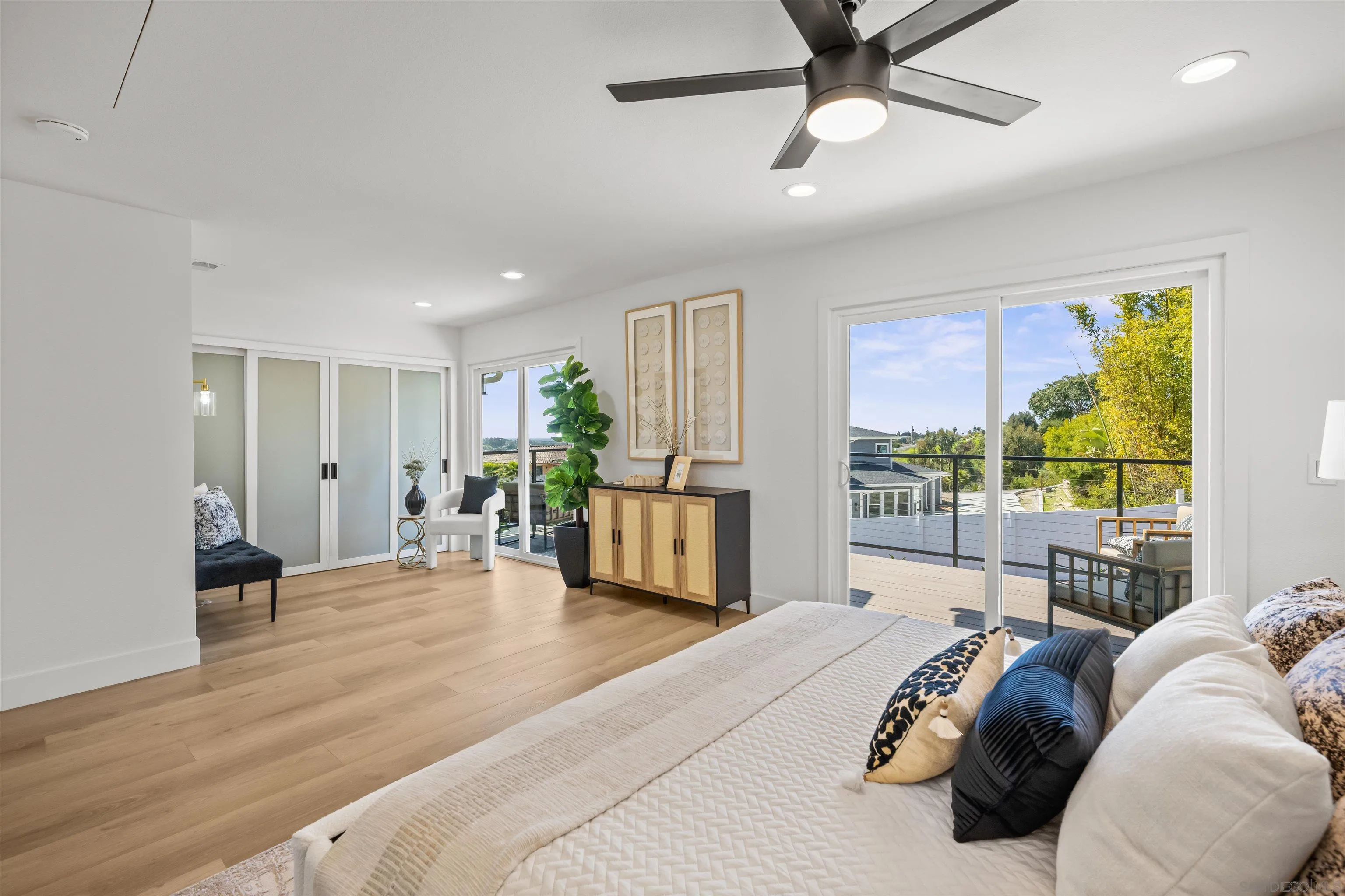 2001 Elevada Street Oceanside, CA 92054 - Photo 16 of 39 a bedroom with furniture and a large window