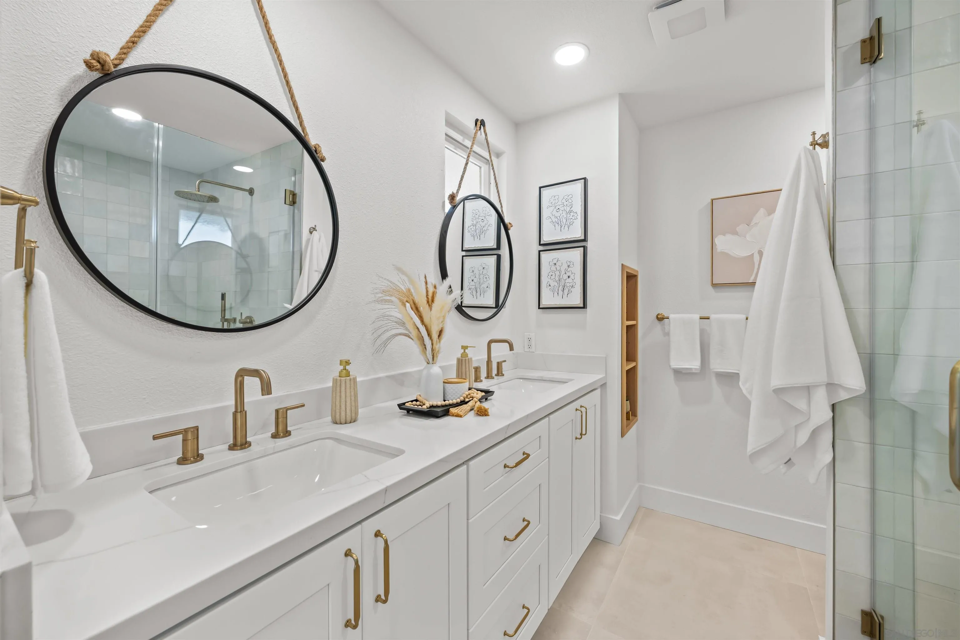 2001 Elevada Street Oceanside, CA 92054 - Photo 19 of 39 a bathroom with a sink double vanity and a mirror