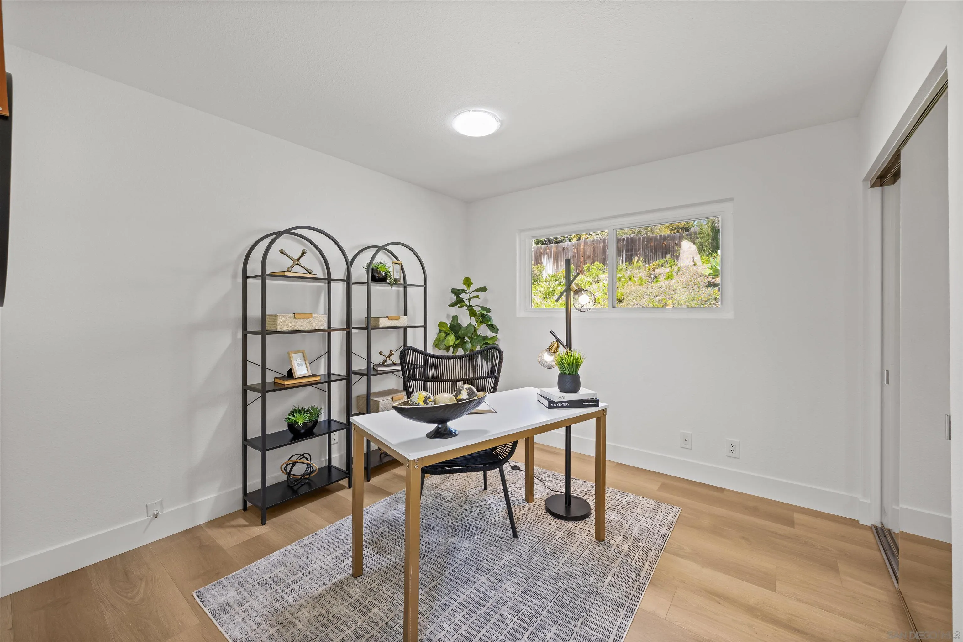 2001 Elevada Street Oceanside, CA 92054 - Photo 24 of 39 a view of a livingroom with furniture and window