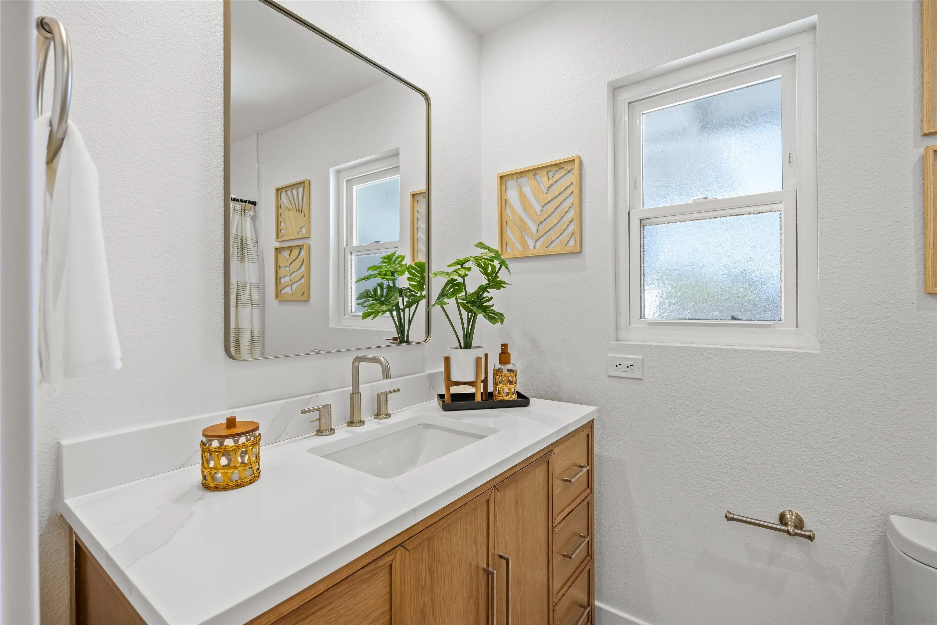 2001 Elevada Street Oceanside, CA 92054 - Photo 25 of 39 a bathroom with a sink a vanity and a mirror