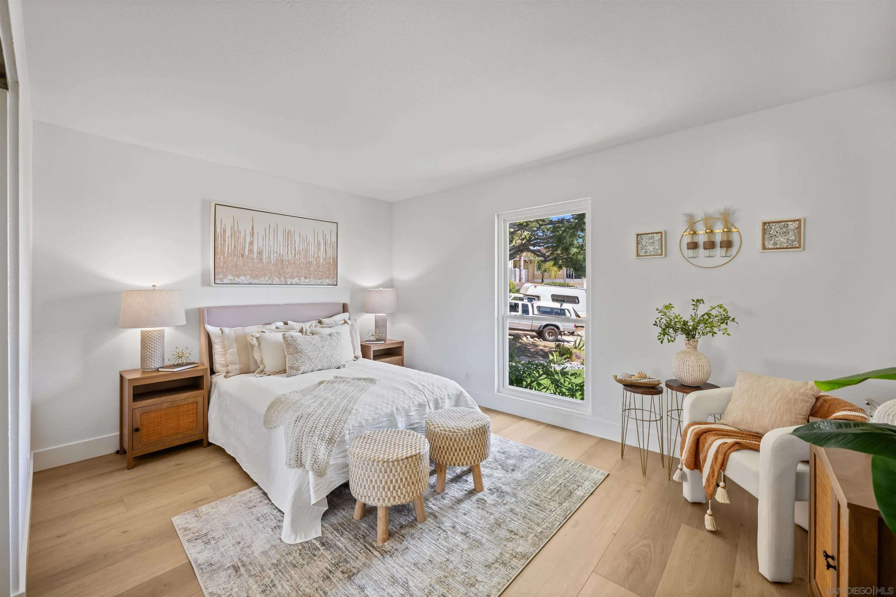 2001 Elevada Street Oceanside, CA 92054 - Photo 26 of 39 a bedroom with a bed and a table in it