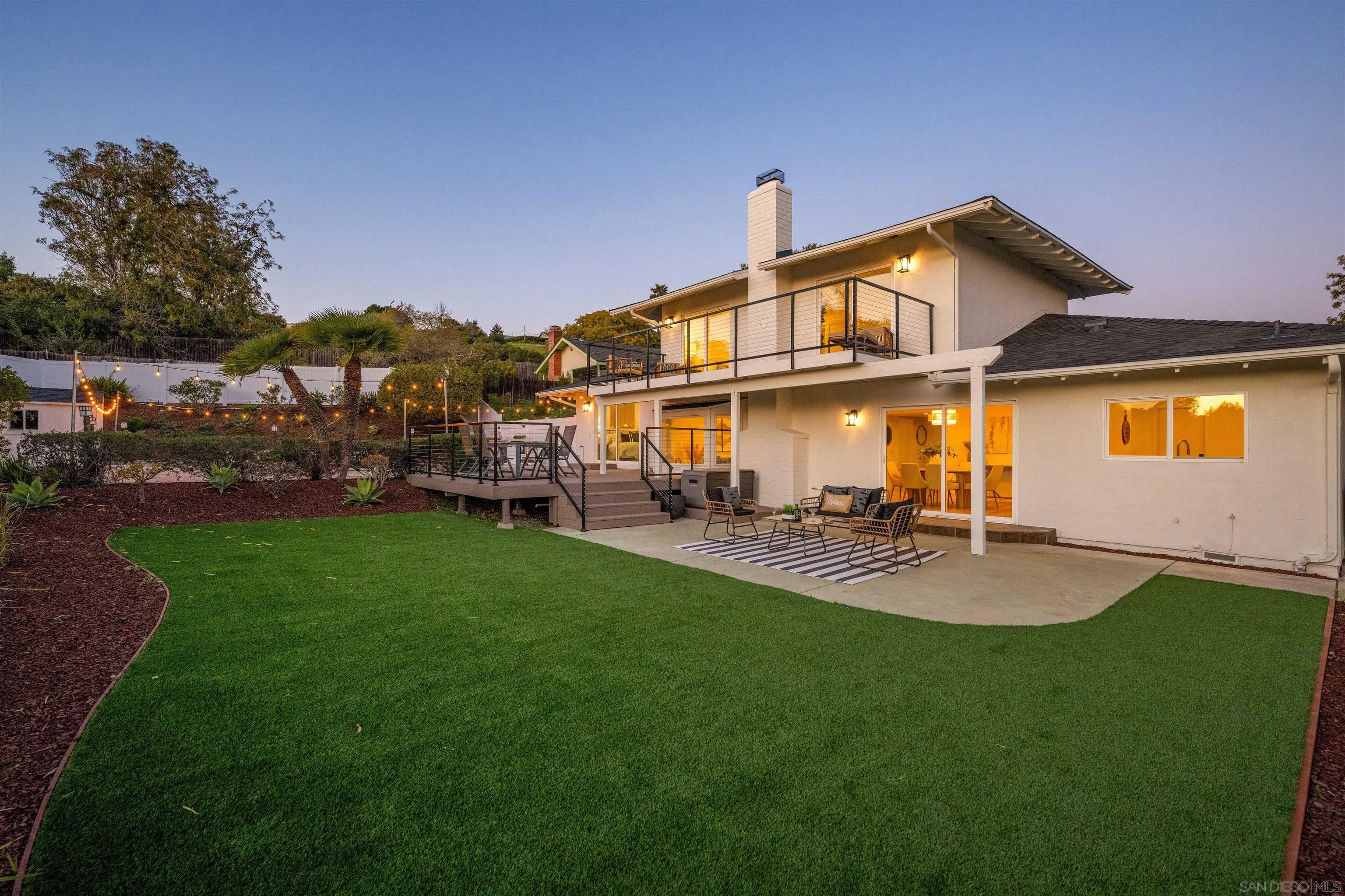 2001 Elevada Street Oceanside, CA 92054 - Photo 32 of 39 a view of a house with backyard and sitting area