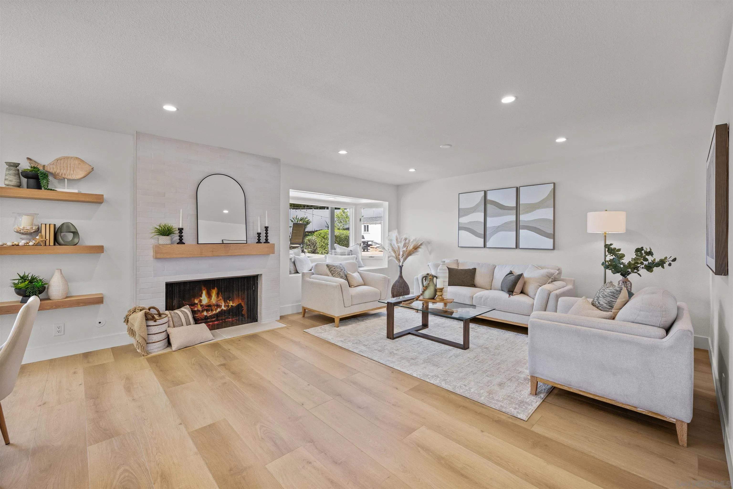 2001 Elevada Street Oceanside, CA 92054 - Photo 6 of 39 a living room with furniture and a fireplace