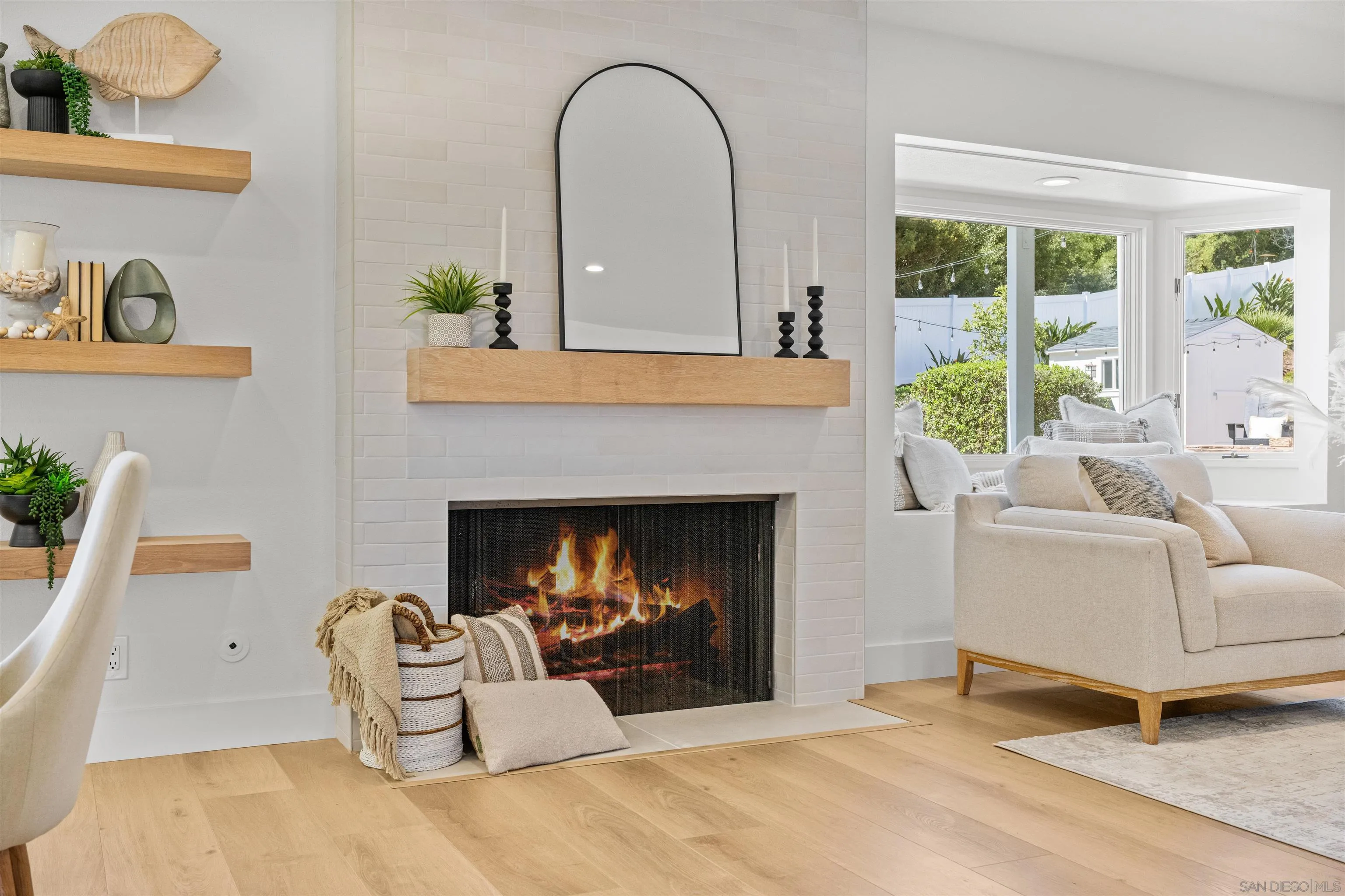 2001 Elevada Street Oceanside, CA 92054 - Photo 7 of 39 a living room with furniture and a fireplace