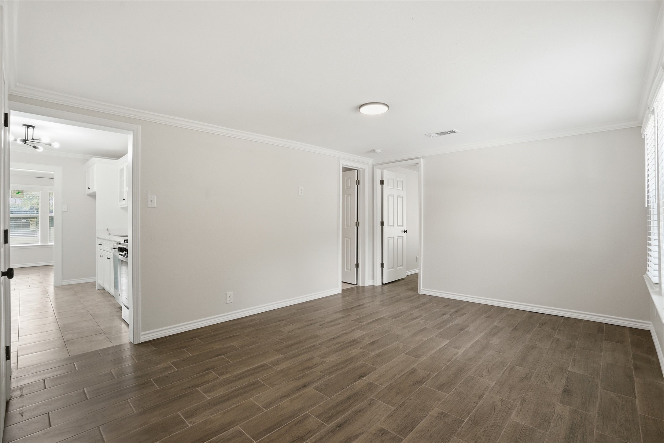 6518 Paris Street Houston, TX 77021 - Photo 18 of 23 wooden floor in an empty room
