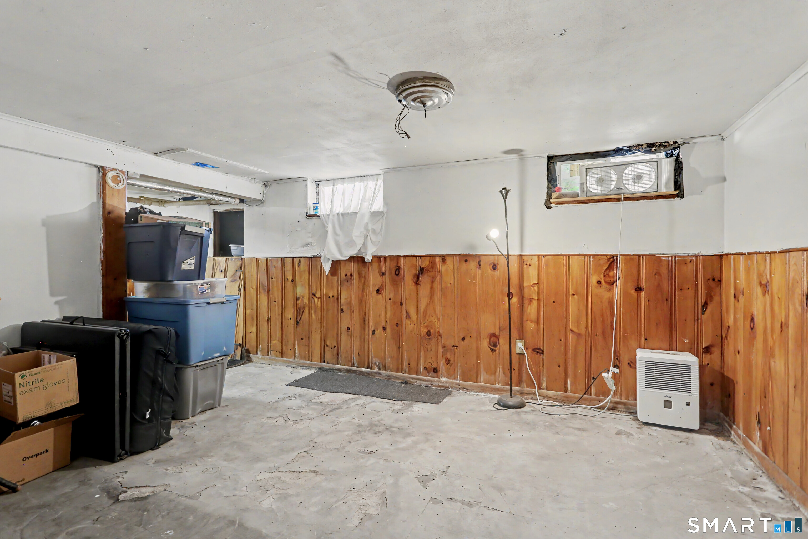 94 2nd Street Hamden, CT 06514 - Photo 26 of 31 a view of a garage with furniture