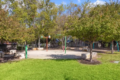 a view of a park with tree s