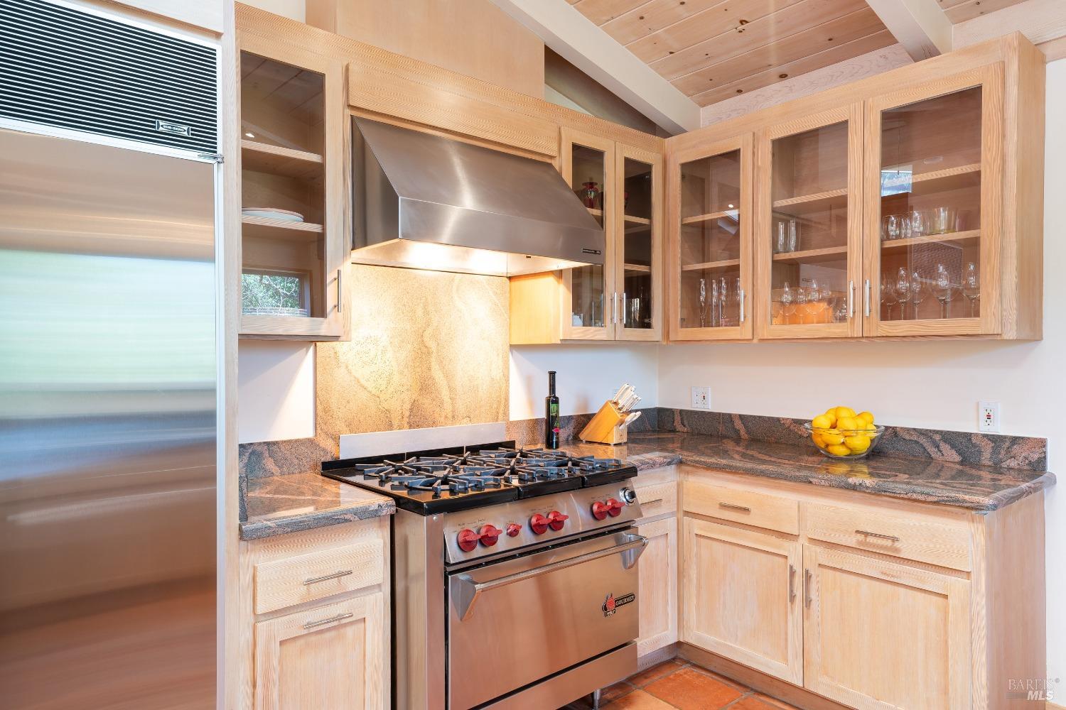 321 Dutch Henry Canyon Road Calistoga, CA 94515 - Photo 14 of 45 a kitchen with a stove and a cabinets