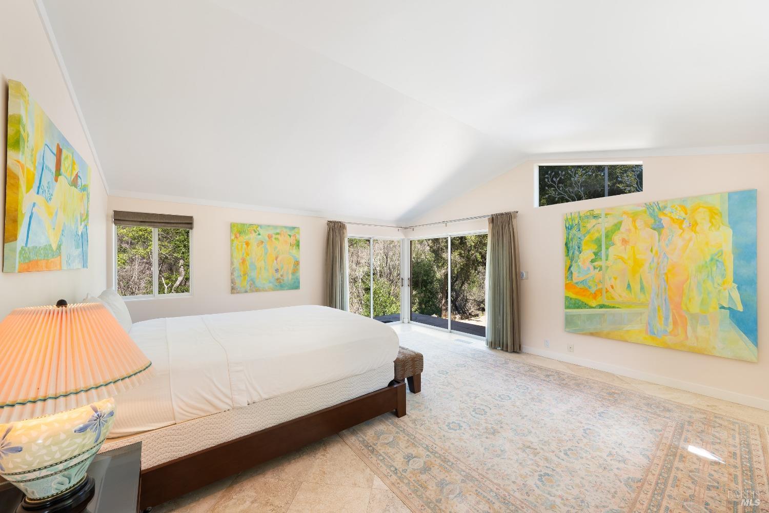 321 Dutch Henry Canyon Road Calistoga, CA 94515 - Photo 27 of 45 a bed sitting in a bedroom next to a window