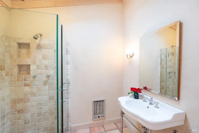 a view of a green field with trees