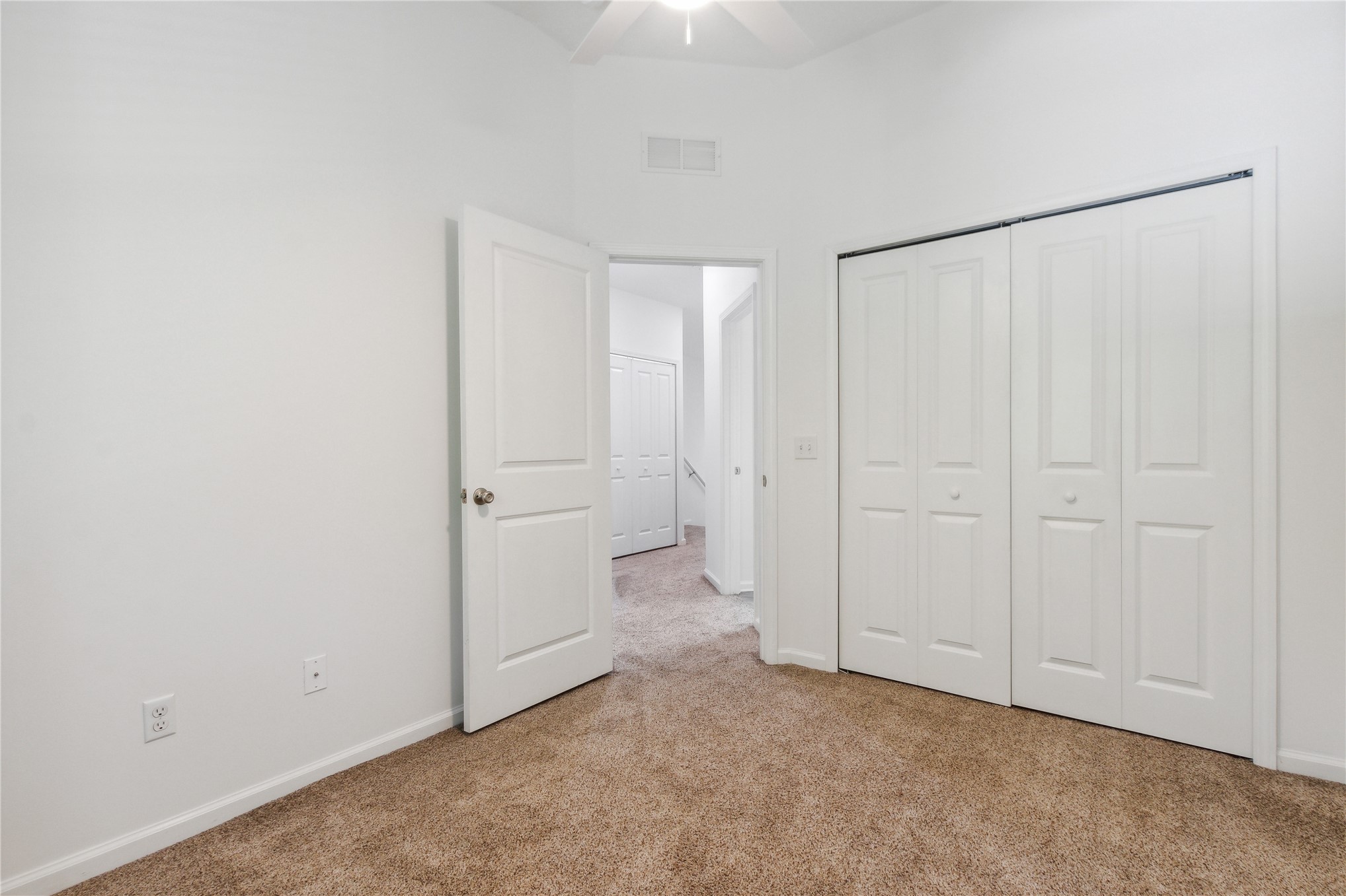 87279 Lents Road Yulee, FL 32097 - Photo 30 of 40 an empty room with a hallway