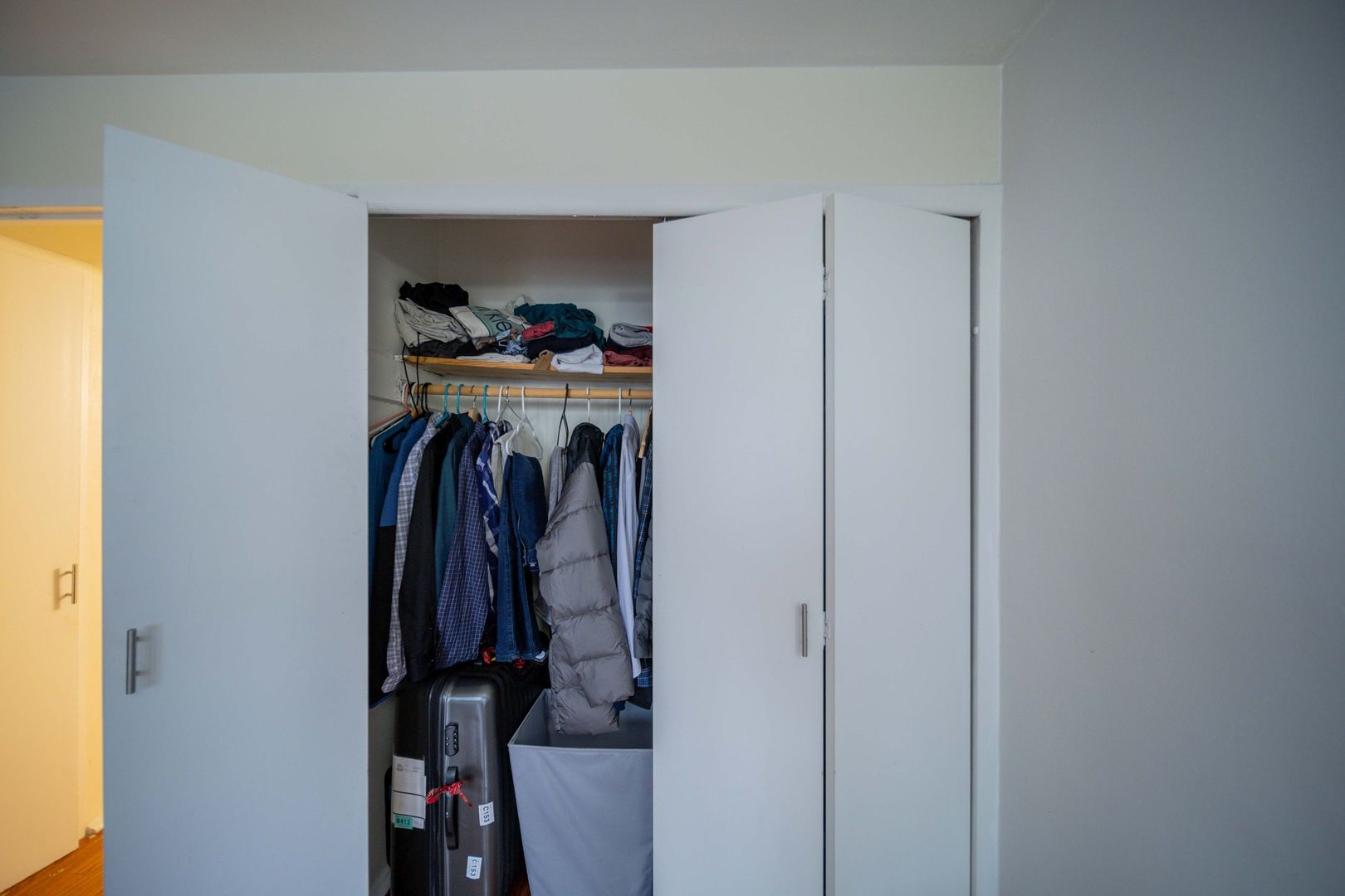 6030 North Sheridan Road, Unit 2011 Chicago, IL 60660 - Photo 12 of 26 a view of walk in closet with clothes and shoes