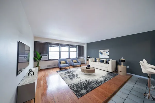 a bed room with furniture and a window
