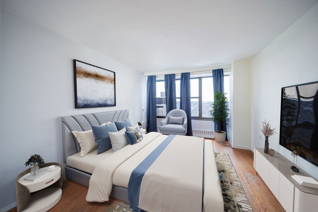 6030 North Sheridan Road, Unit 2011 Chicago, IL 60660 - Photo 10 of 26 a bedroom with a bed and a flat screen tv