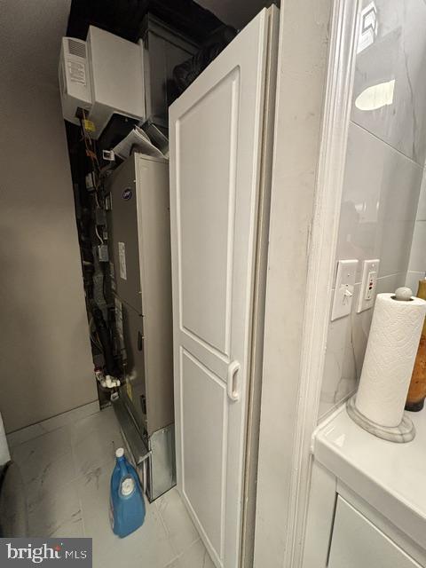 608 6th Place Southwest Washington, DC 20024 - Photo 17 of 65 Compact utility space with appliances.