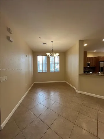 a view of a room and window