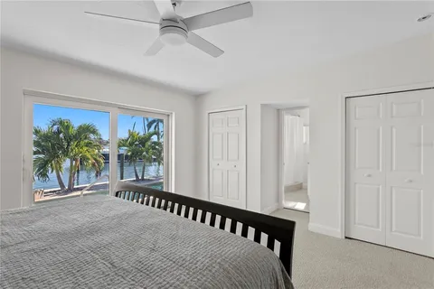 a bathroom with a sink double vanity and a mirror