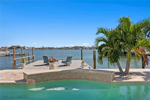 wooden floor with view of residential buildings and outdoor space