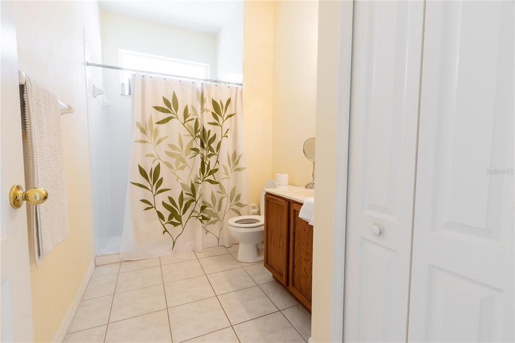 1812 Flower Branch Way Valrico, FL 33594 - Photo 28 of 42 a bathroom with a shower and a sink