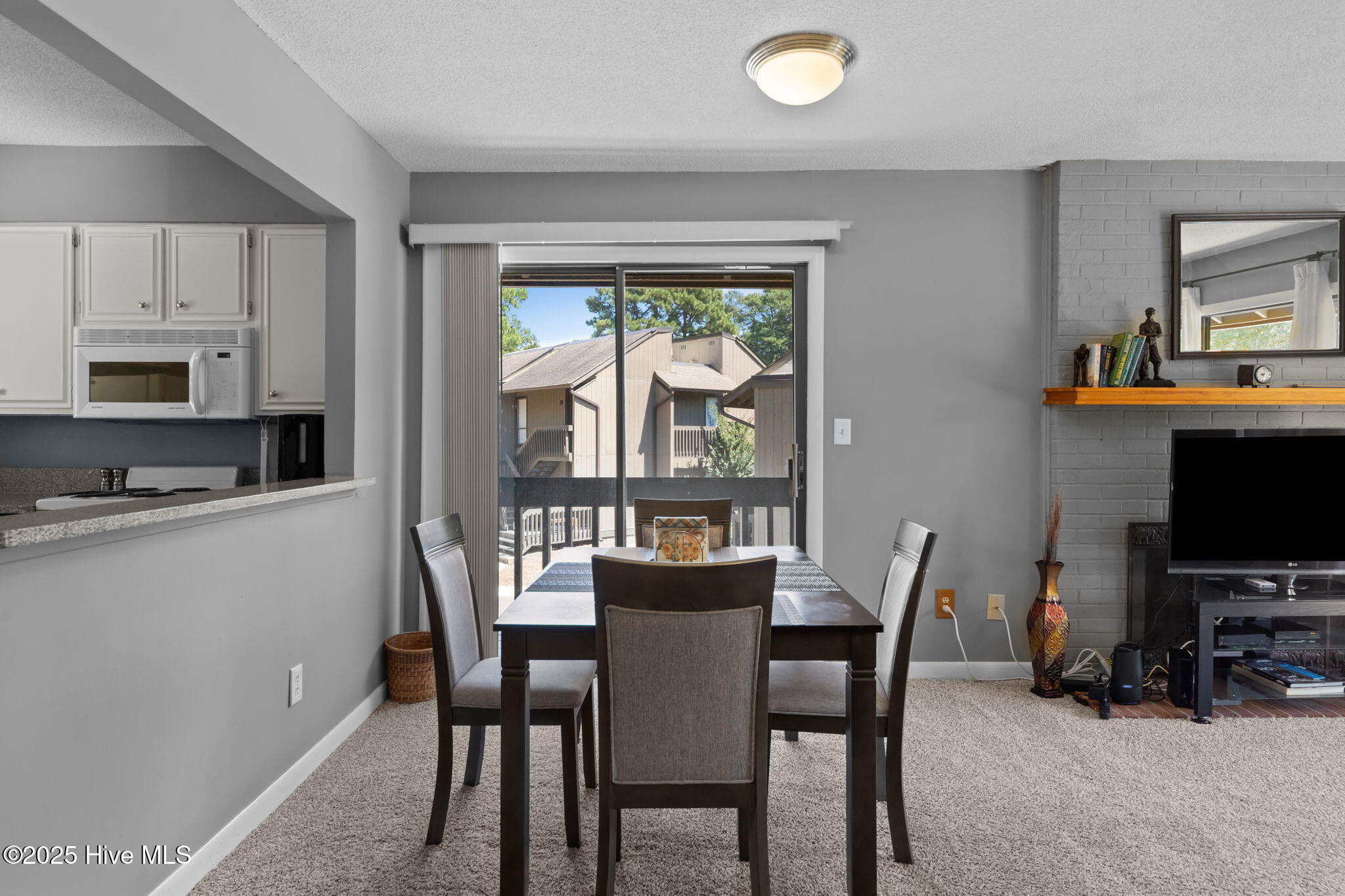 85 Pine Valley Road, Unit 16 Pinehurst, NC 28374 - Photo 21 of 43 Balcony off of dining