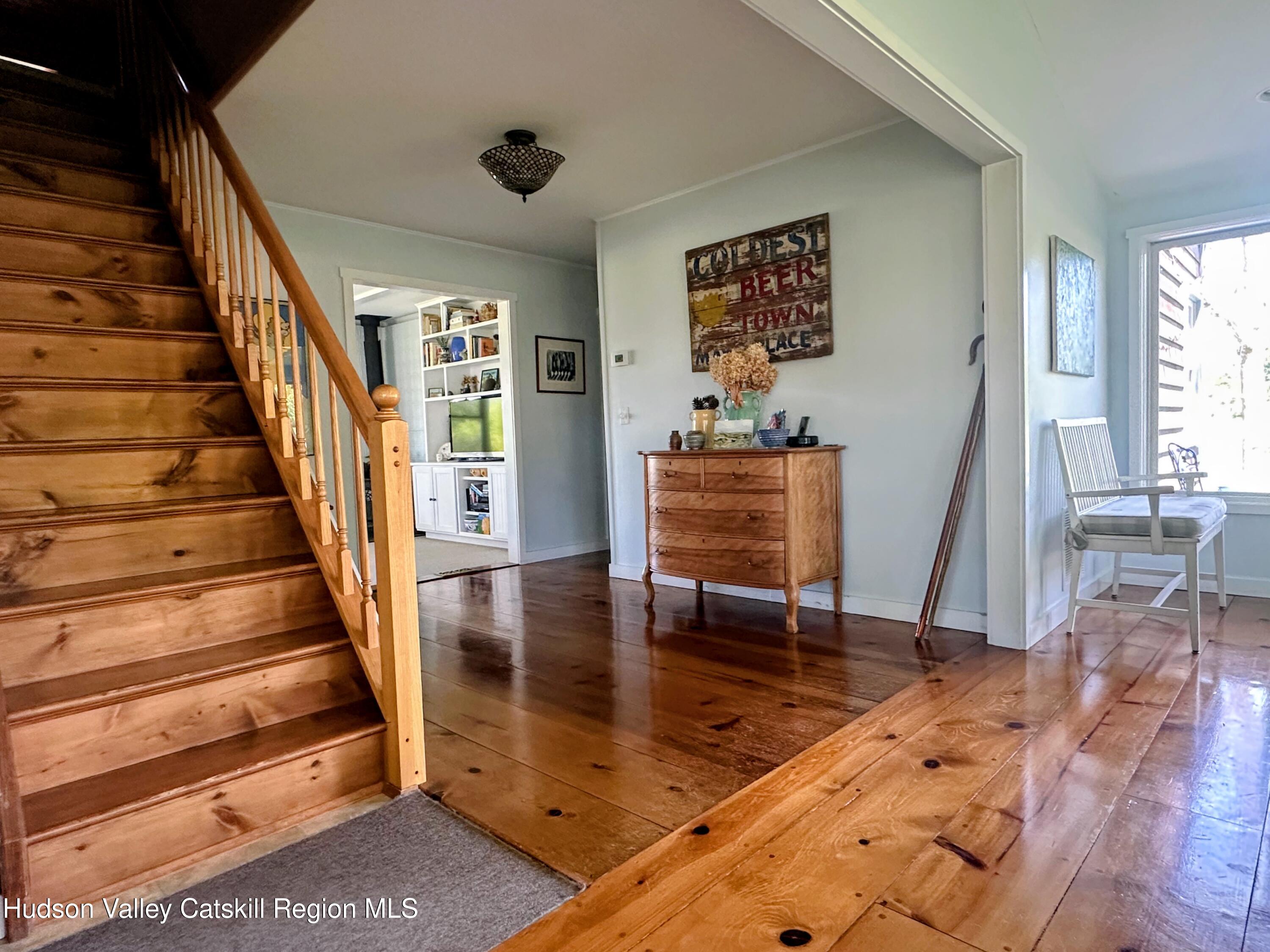 1492 County Road Copake, NY 12516 - Photo 10 of 34 a view of entryway and hall with wooden floor