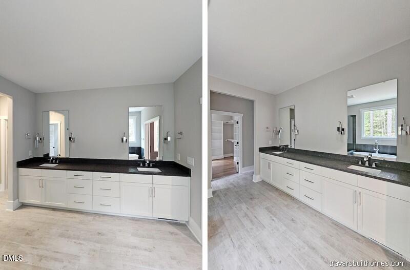 5491 Silk Hope Gum Spring Road Siler City, NC 27344 - Photo 12 of 17 a large white kitchen with granite countertop a sink and cabinets