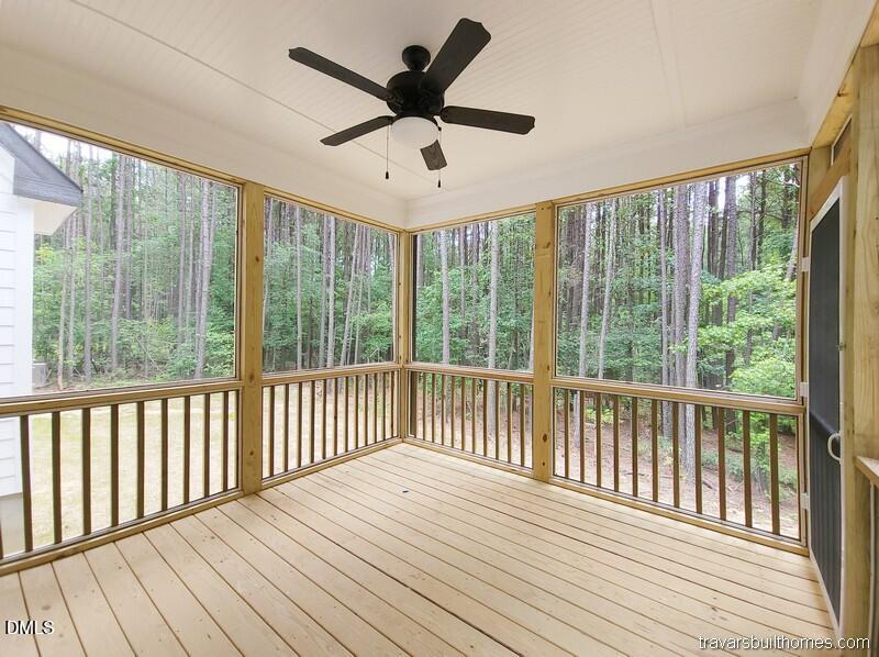 5491 Silk Hope Gum Spring Road Siler City, NC 27344 - Photo 17 of 17 a view of a balcony with wooden floor