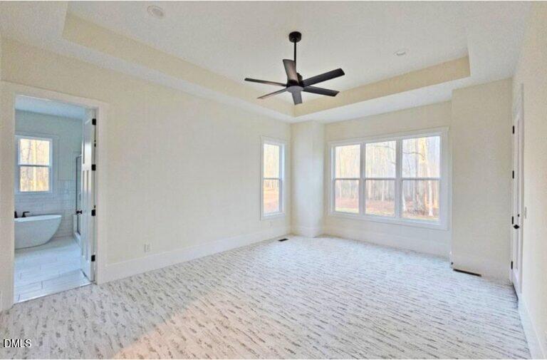 5491 Silk Hope Gum Spring Road Siler City, NC 27344 - Photo 9 of 17 a view of an empty room with a window