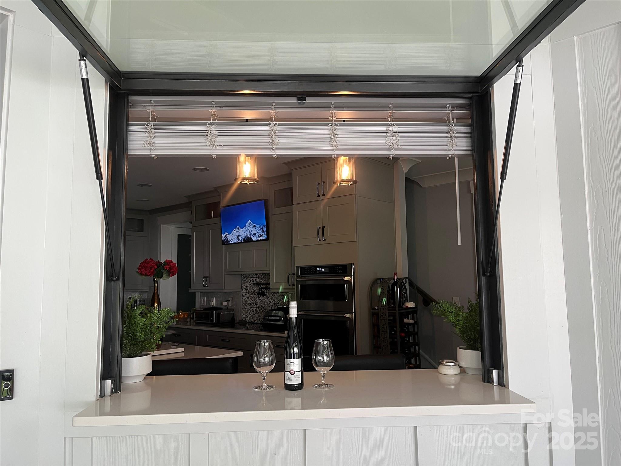 900 Houston Heights Road Charlotte, NC 28262 - Photo 19 of 44 a bathroom with a mirror and a shower