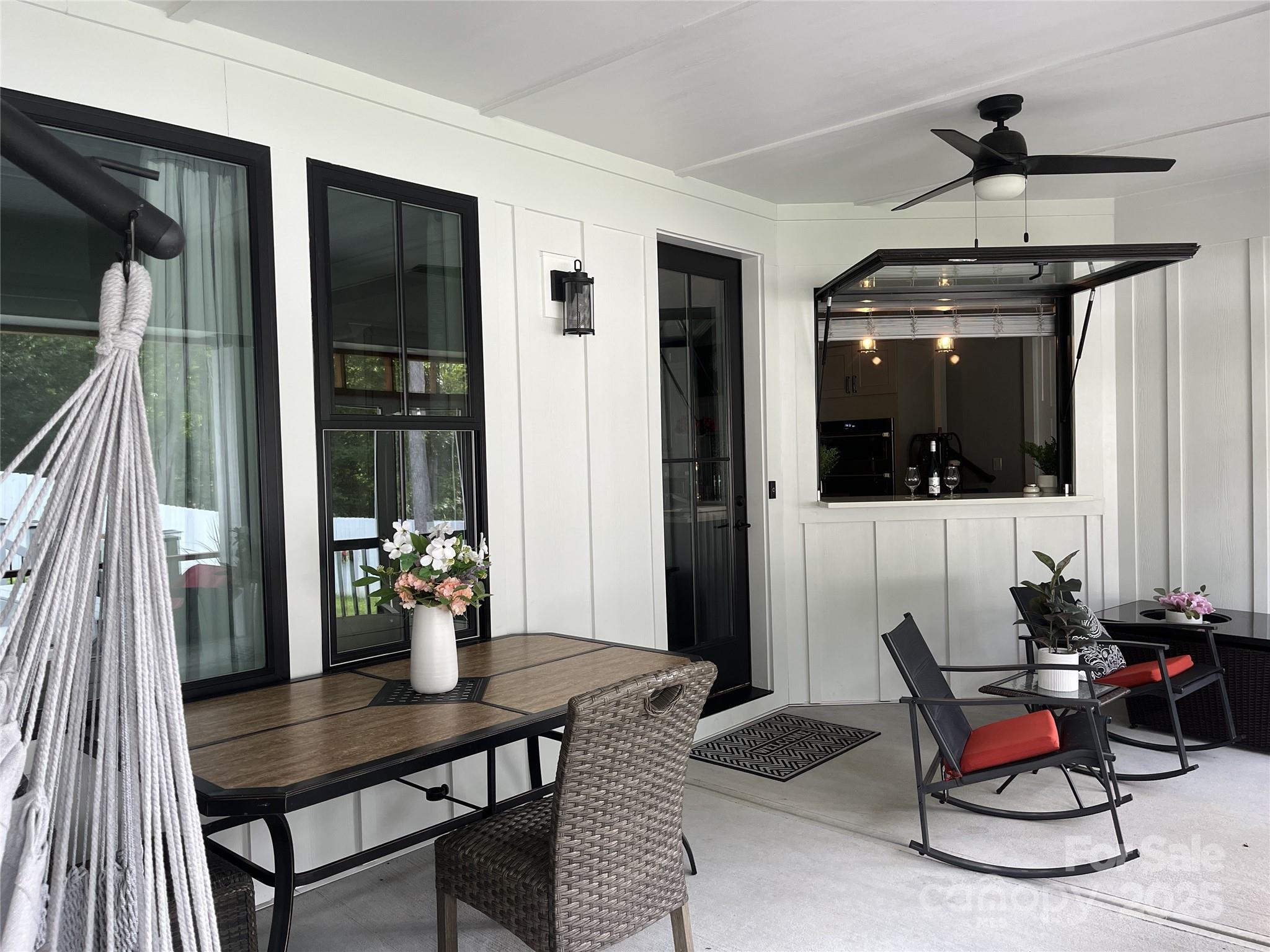 900 Houston Heights Road Charlotte, NC 28262 - Photo 20 of 44 a dining room with furniture and wooden floor