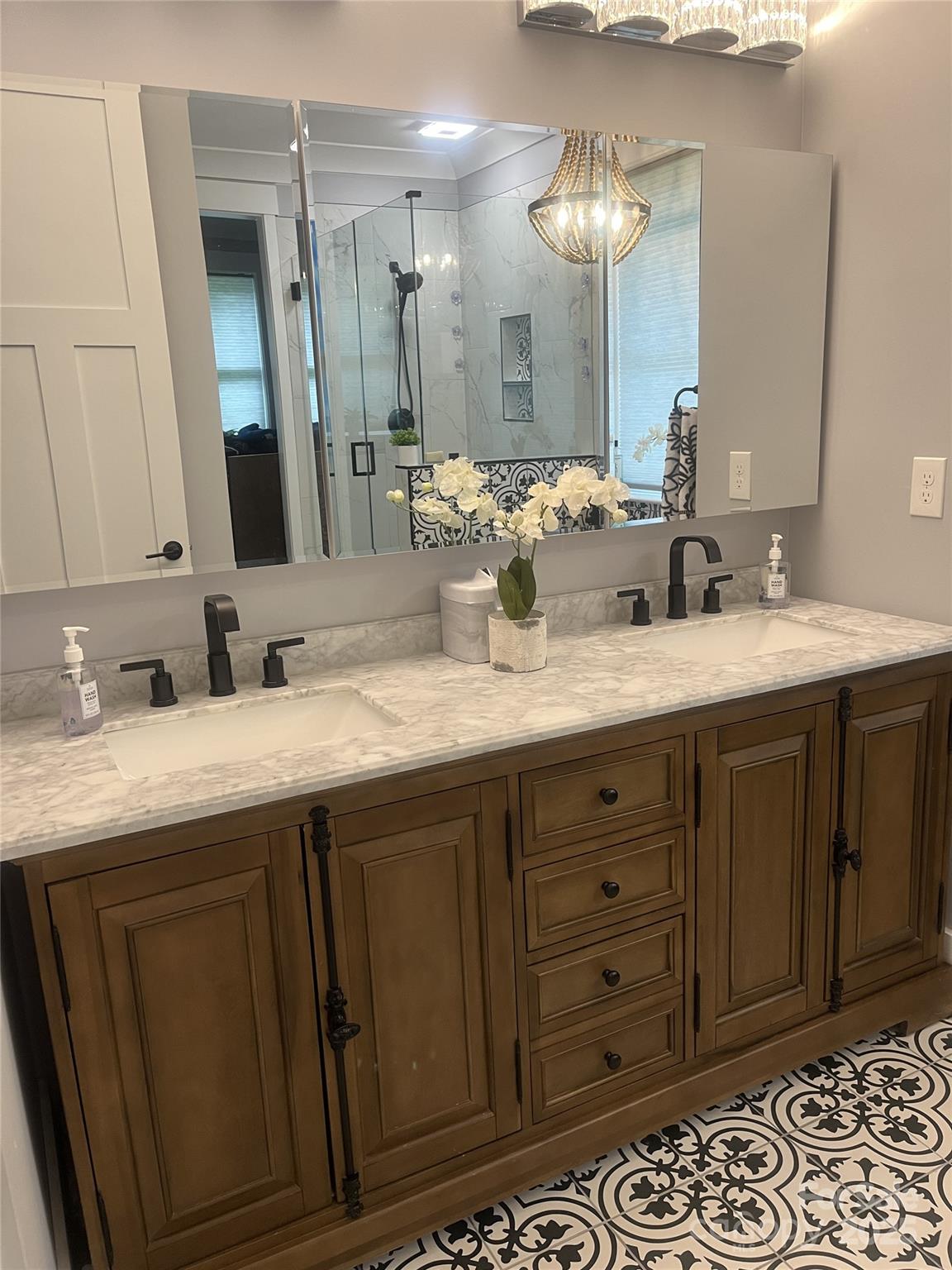 900 Houston Heights Road Charlotte, NC 28262 - Photo 25 of 44 a bathroom with a granite countertop sink and a mirror