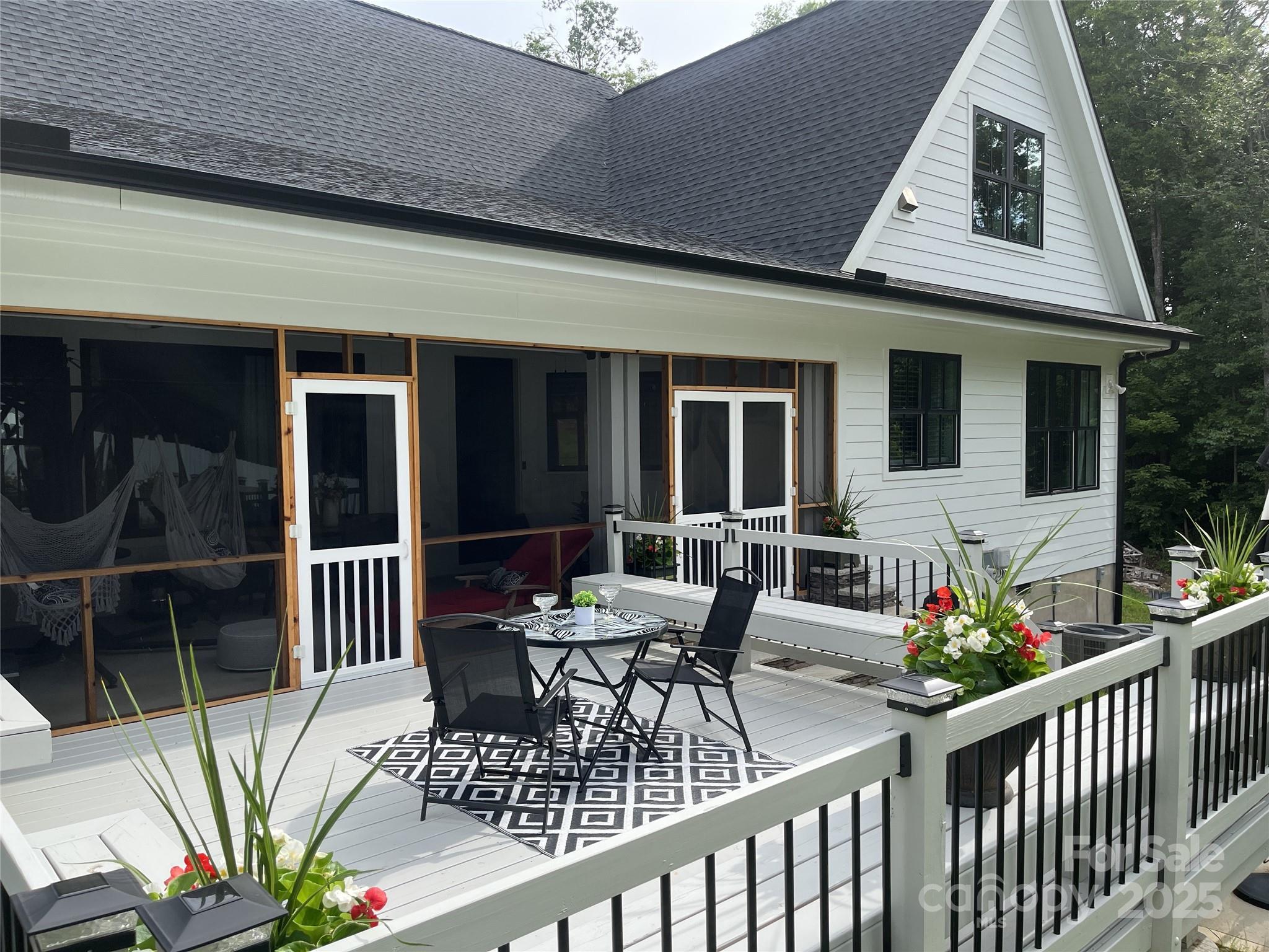 900 Houston Heights Road Charlotte, NC 28262 - Photo 40 of 44 a view of a patio with a dining table and chairs