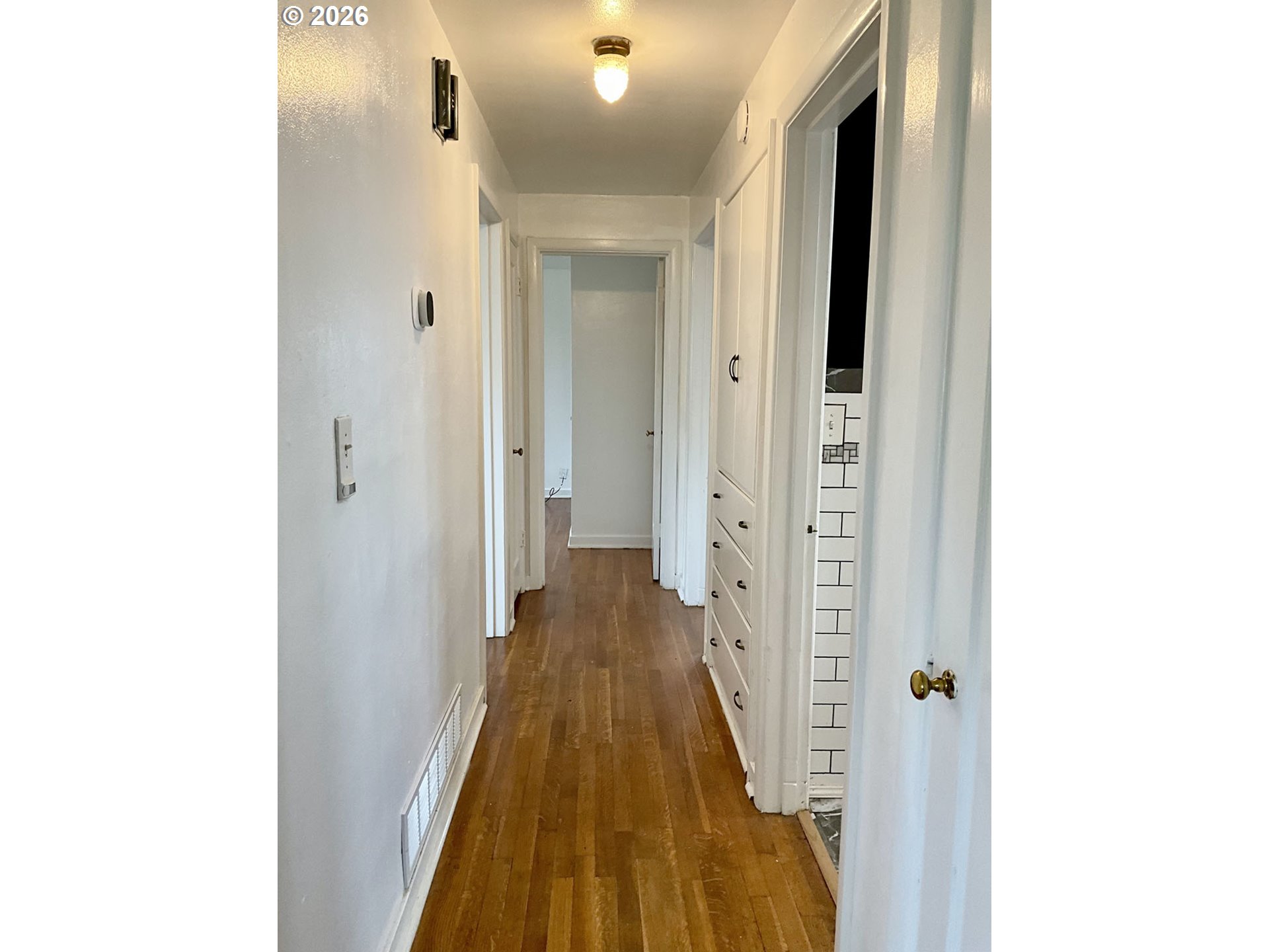 480 Gilbert Street Eugene, OR 97402 - Photo 13 of 33 a view of a hallway with a white door