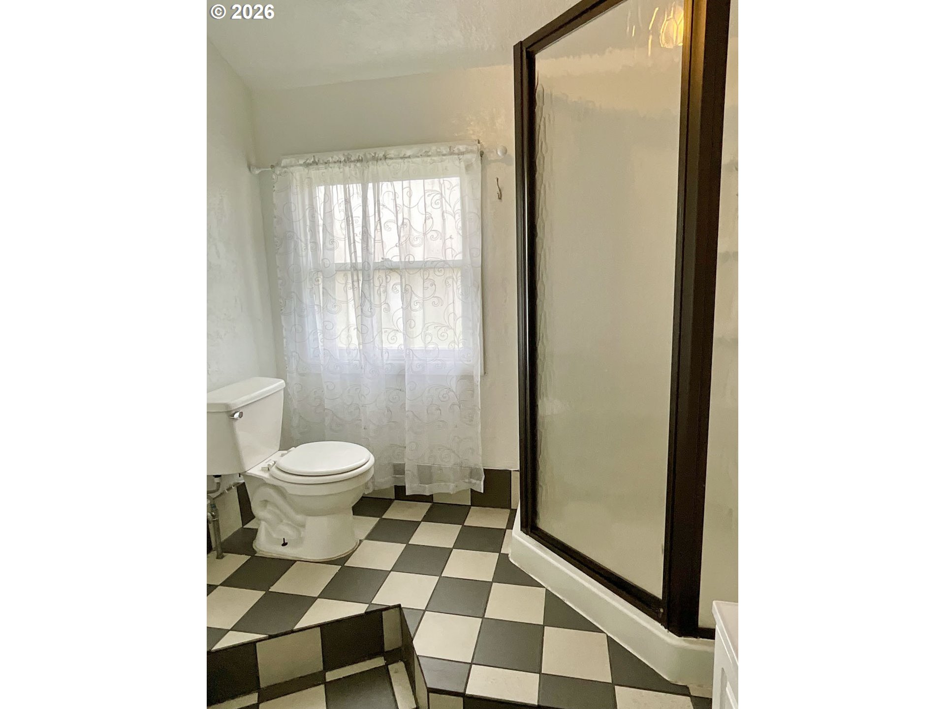 480 Gilbert Street Eugene, OR 97402 - Photo 21 of 33 a bathroom with a toilet and a shower