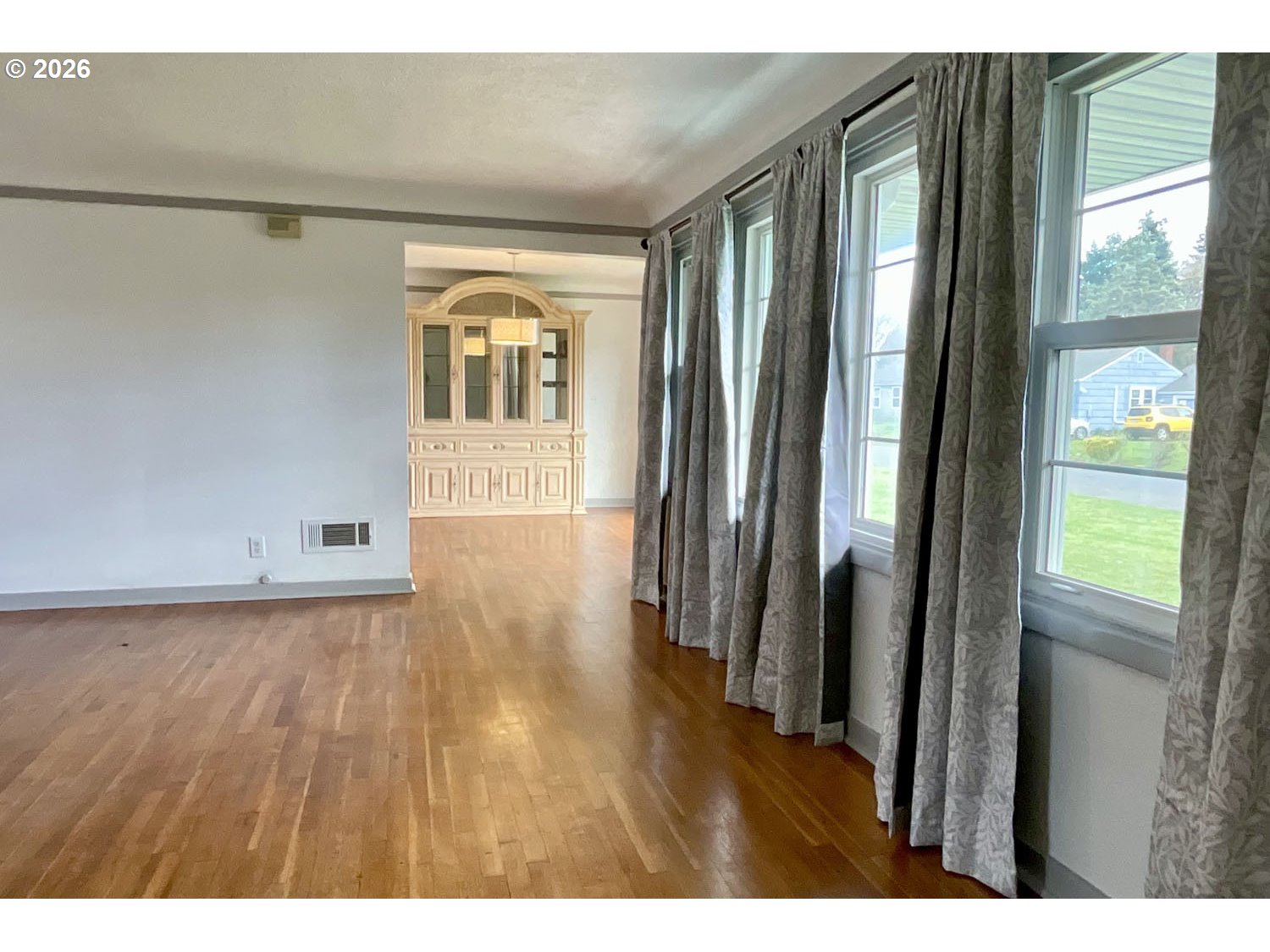 480 Gilbert Street Eugene, OR 97402 - Photo 5 of 33 a view of a hallway with wooden floor and staircase