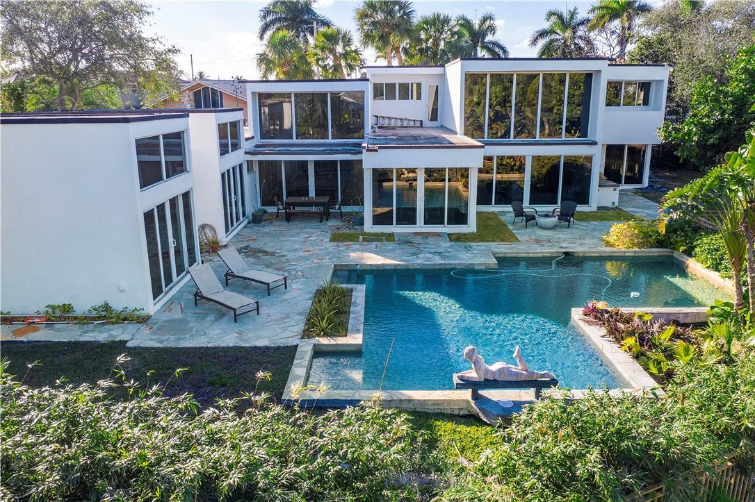 front view of a house with swimming pool