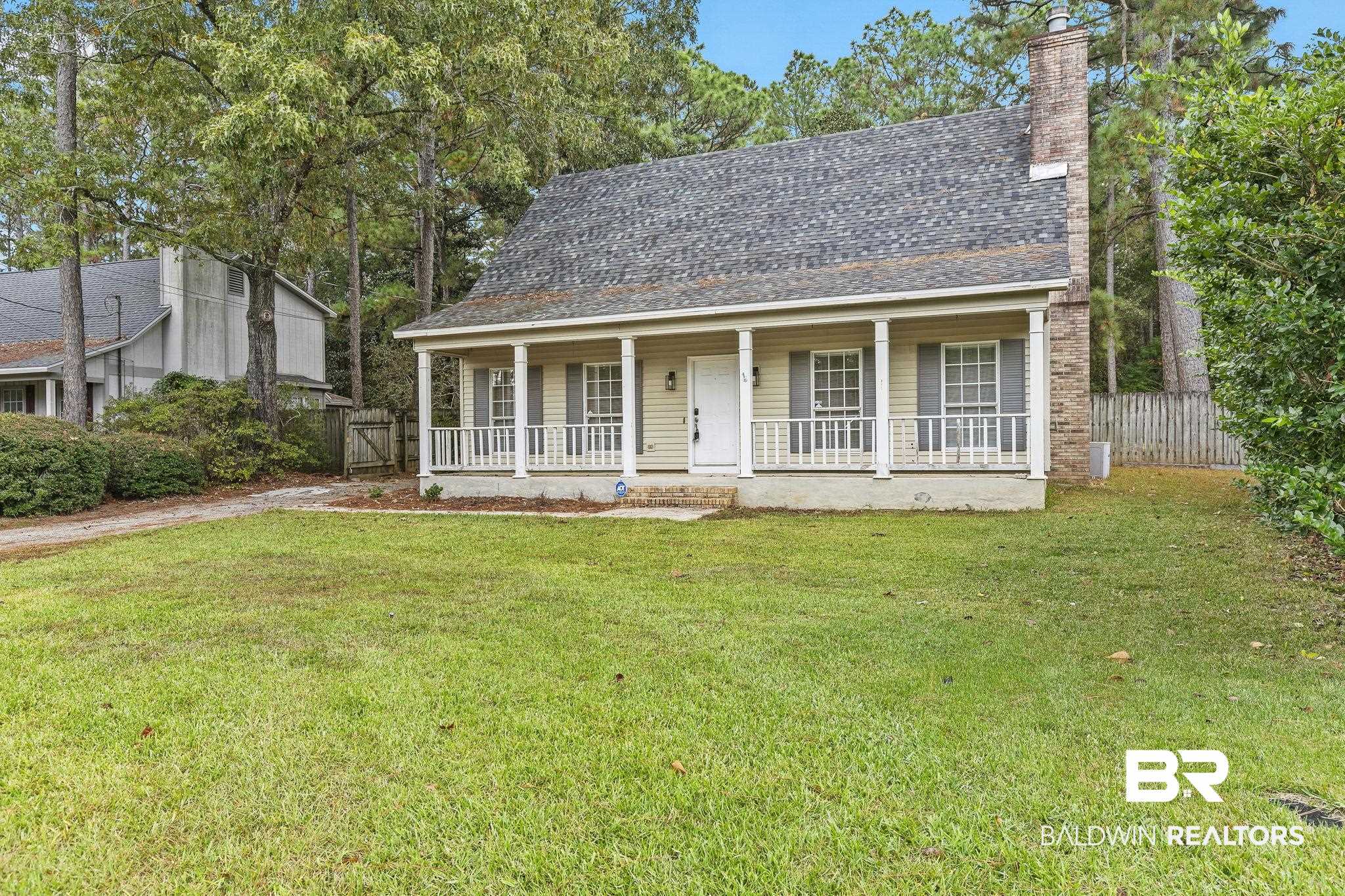 474 Ridgewood Drive Daphne, AL 36526 - Photo 4 of 57 View of front of property featuring a porch and a front yard