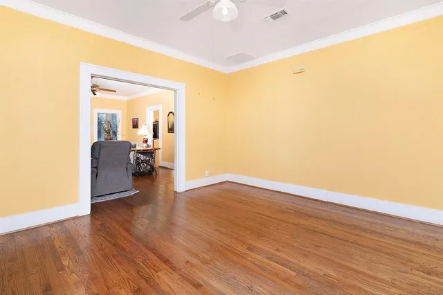 a view of a livingroom with wooden floor