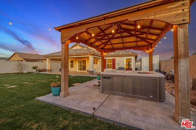 a view of a house with a back yard