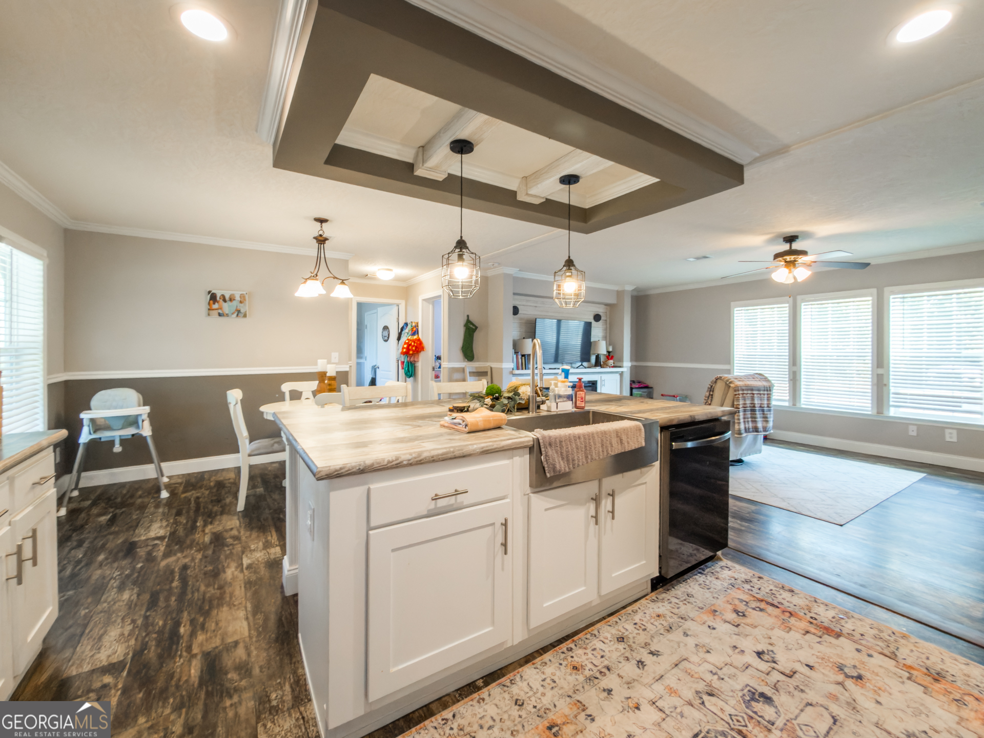 12546 Highway 1 Wrens, GA 30833 - Photo 13 of 41 a large kitchen with kitchen island a sink stainless steel appliances and cabinets