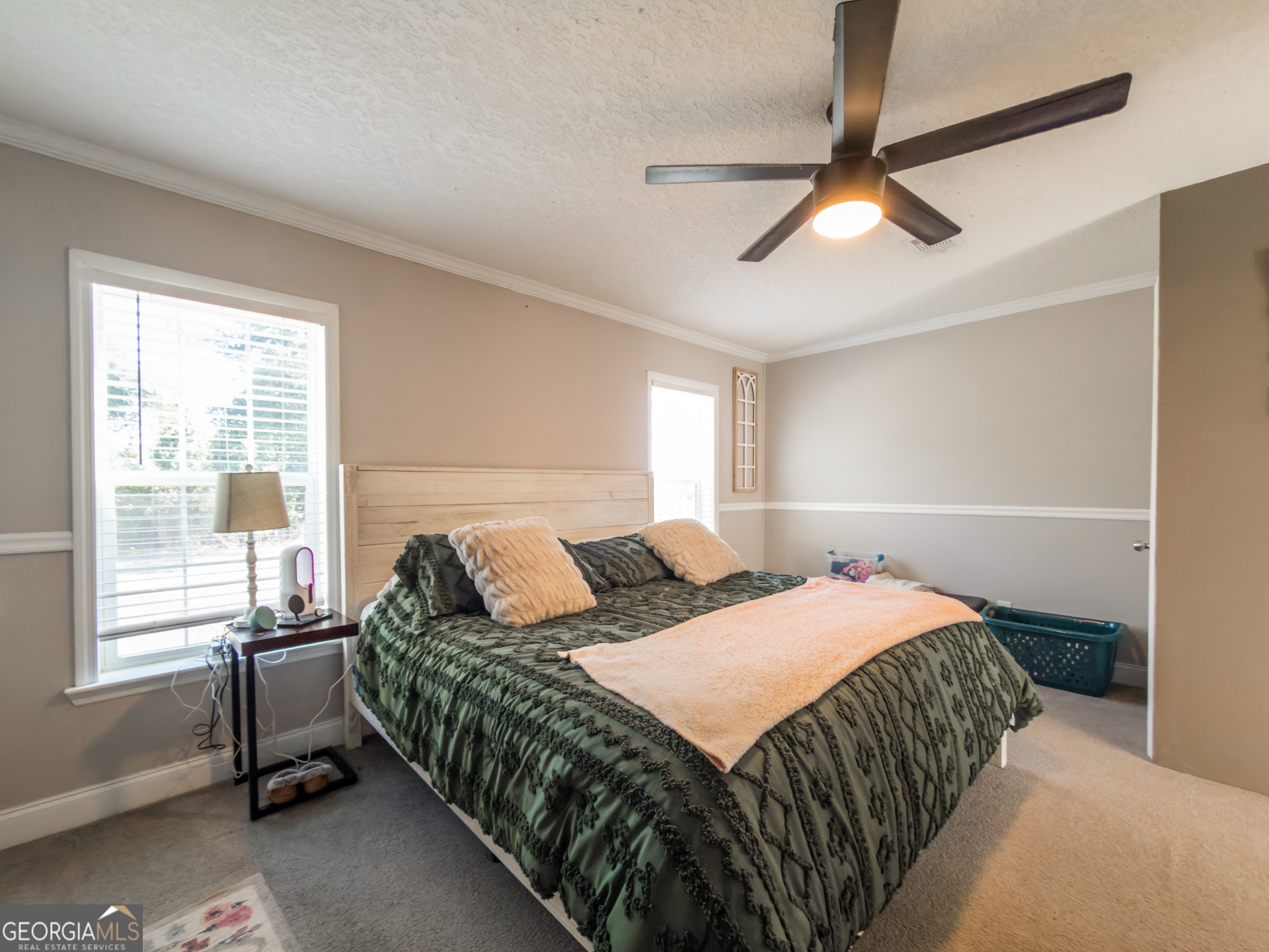 12546 Highway 1 Wrens, GA 30833 - Photo 19 of 41 a bedroom with a bed and a window