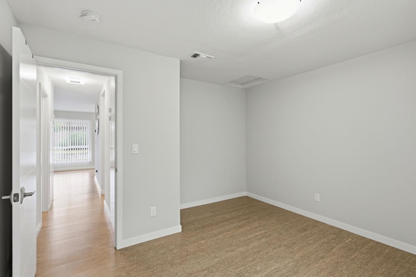 152 Castillion Terrace Santa Cruz, CA 95060 - Photo 18 of 37 wooden floor in an empty room