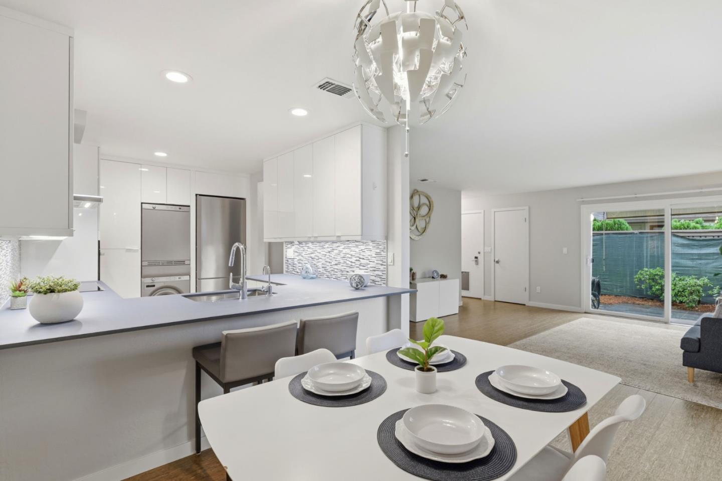 152 Castillion Terrace Santa Cruz, CA 95060 - Photo 3 of 37 a kitchen with furniture and a dining table