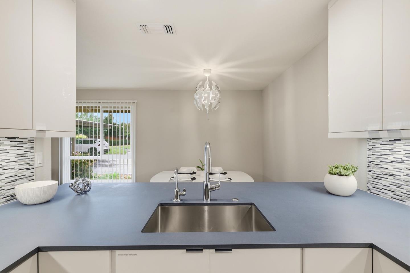 152 Castillion Terrace Santa Cruz, CA 95060 - Photo 9 of 37 a kitchen with a sink and a window